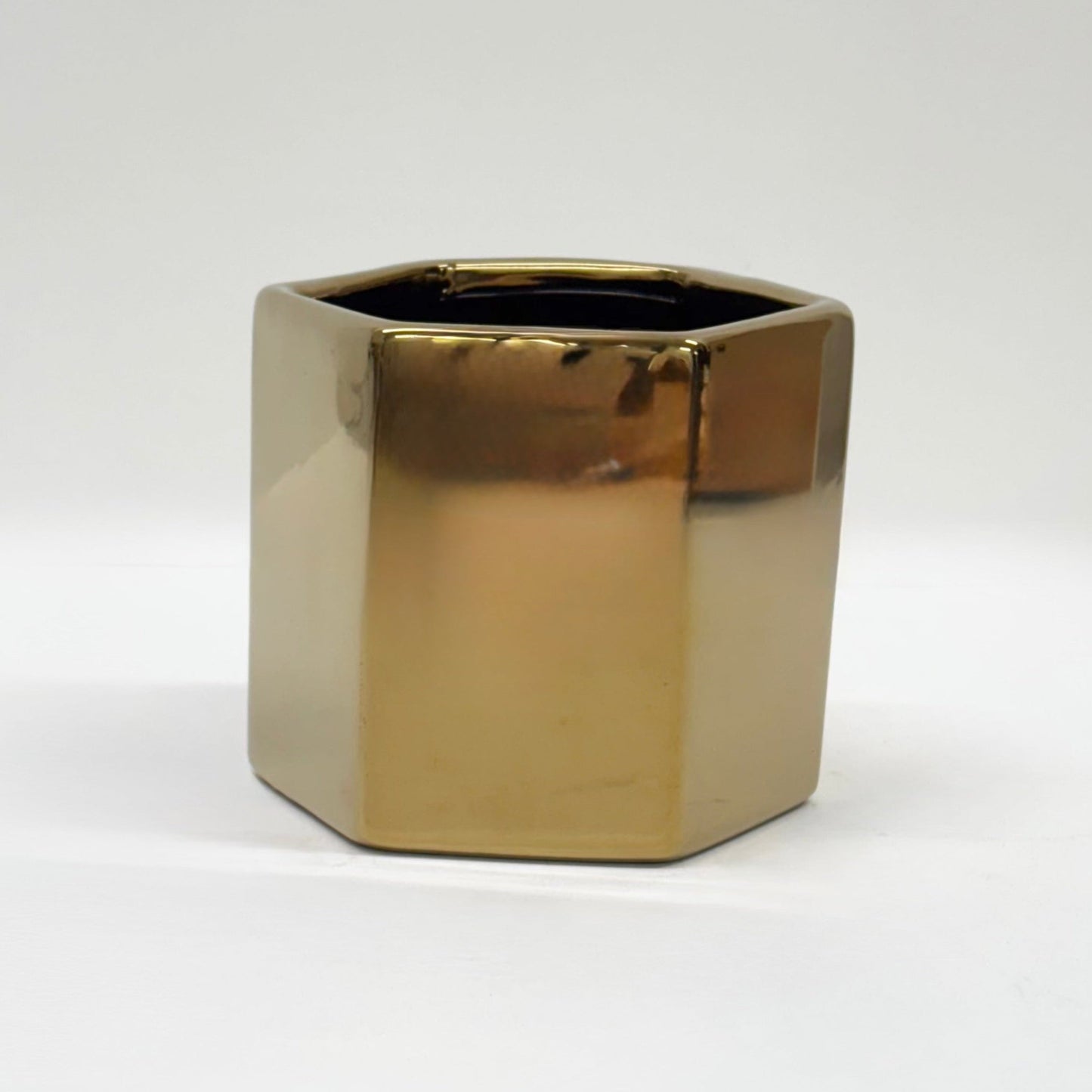 Elegant Gold Decorative Planter with Minimalist Metal Stand