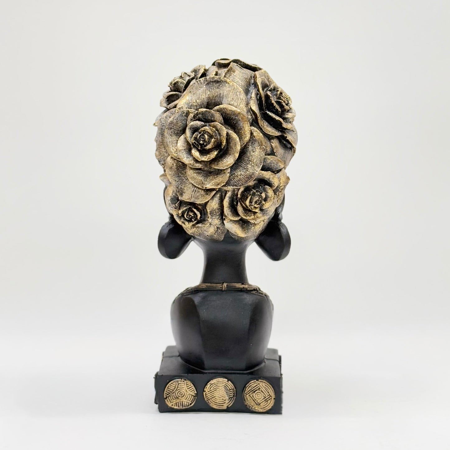 African Heritage Black Sculpture with Gold Detailing