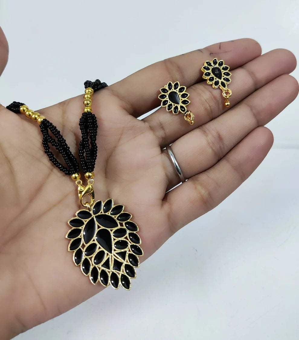 Midnight Leaf Charm
