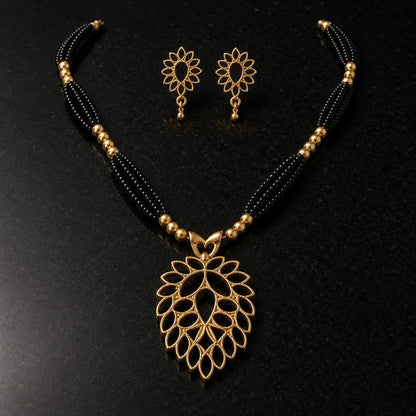 Midnight Leaf Charm